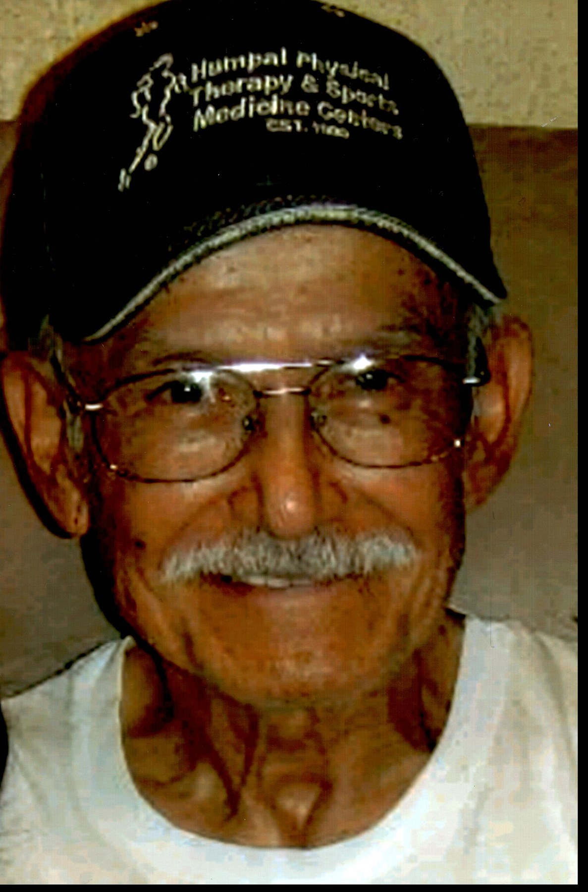 Obituary of Ramiro E. Quezada