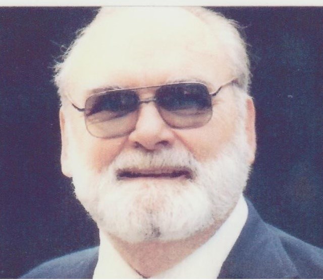 Obituary of Edward A. McCarroll