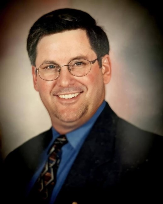 Obituary of Charles Edward Larsen