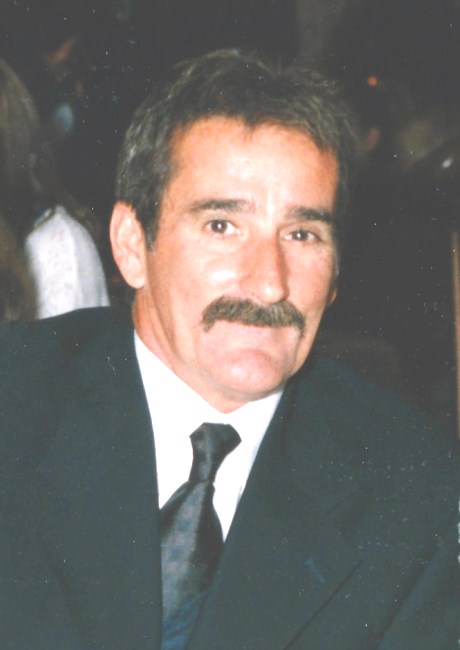 Obituario de Allan J. Lopes