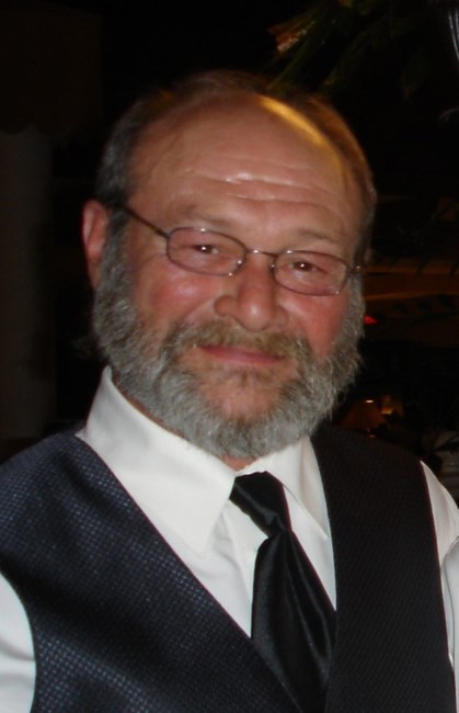 Obituary of Daniel R. "Pops" Lovett