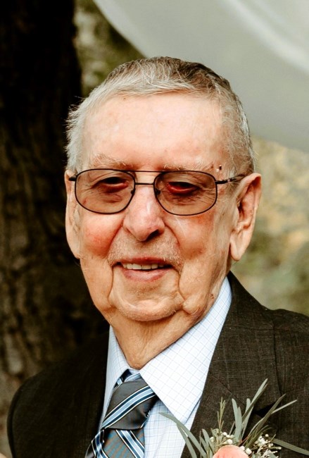 Obituary of Earl C. Milligan