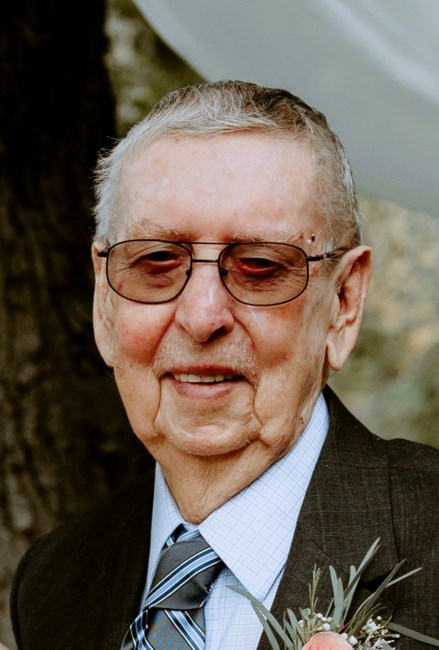 Obituary of Earl C. Milligan