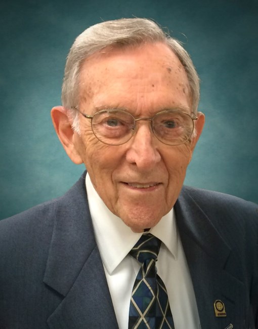 Obituary of John E Robertson