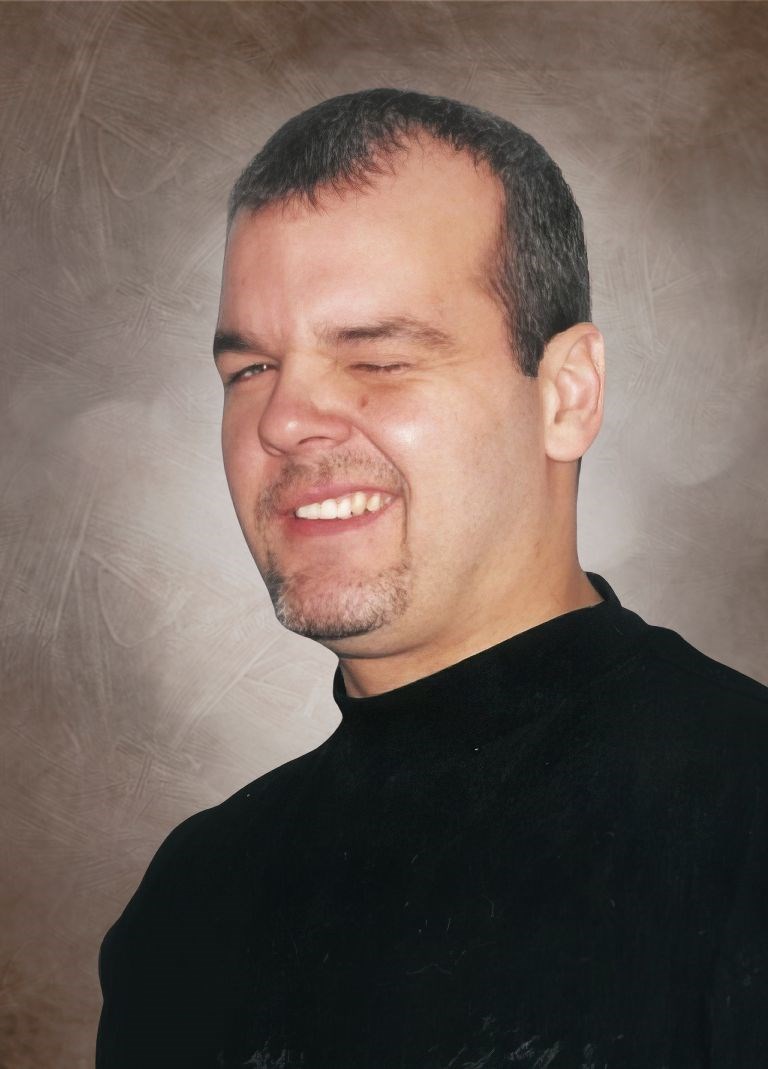 Obituary of M. Raymond Pineault