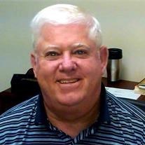 Obituary of Arthur E McGuire