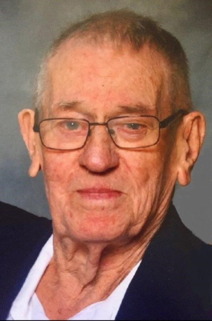 Obituary of John E. Norman