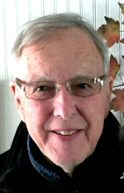 Obituario de John E. Peterson