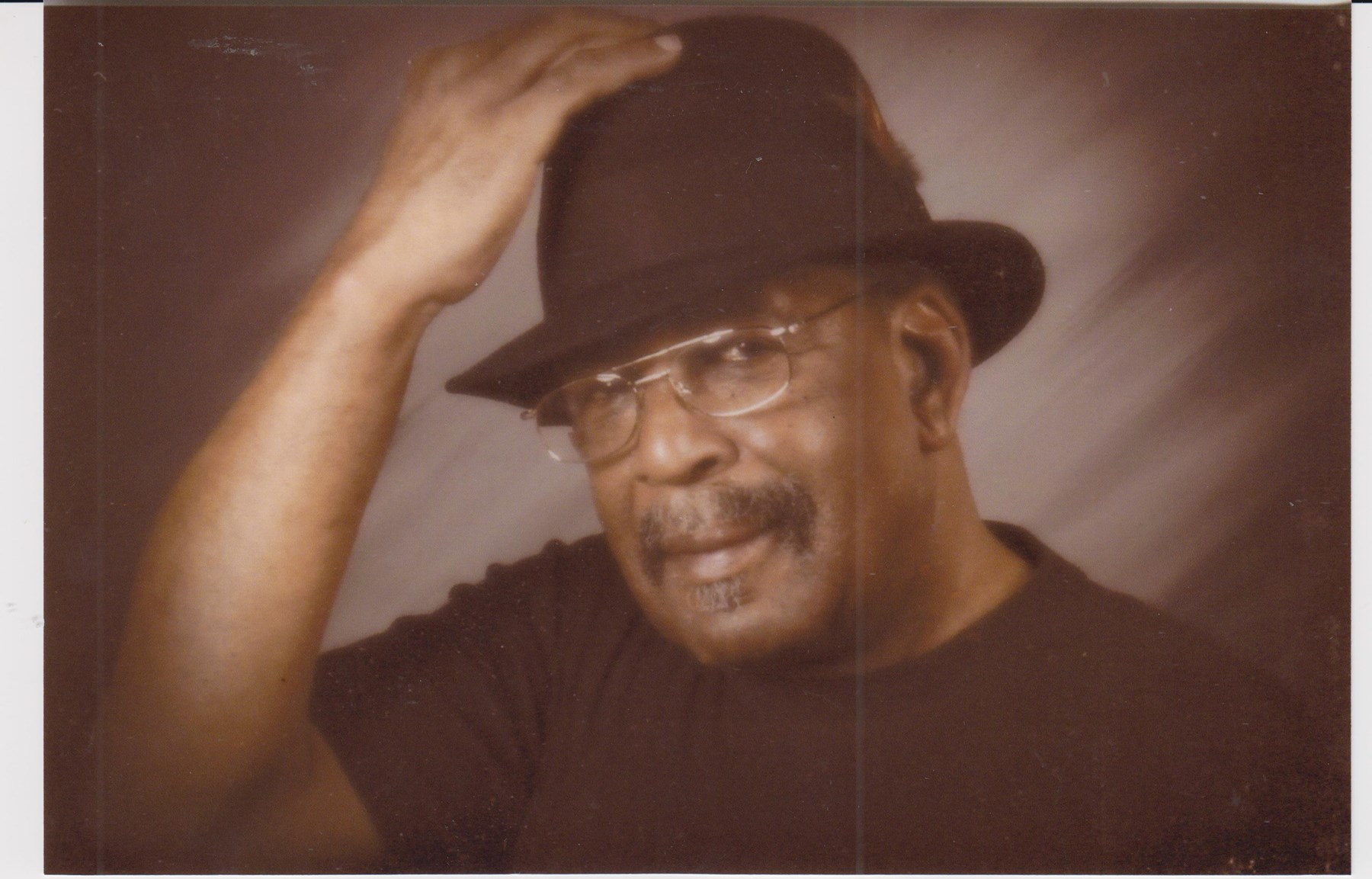 Obituario de RE Holman