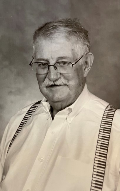 Obituary of John E Schliessmann