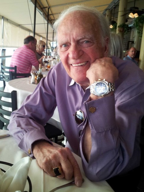 Obituary of William E White