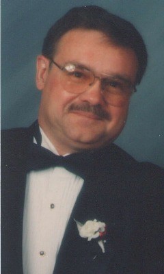 Obituary of Hugh E. Rousseau