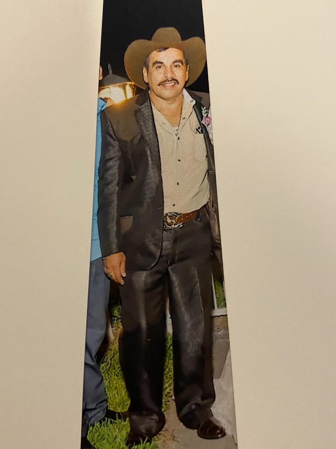 Obituary of Juan Carlos Flores