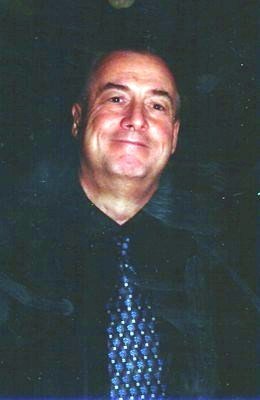 Obituary of John Carey