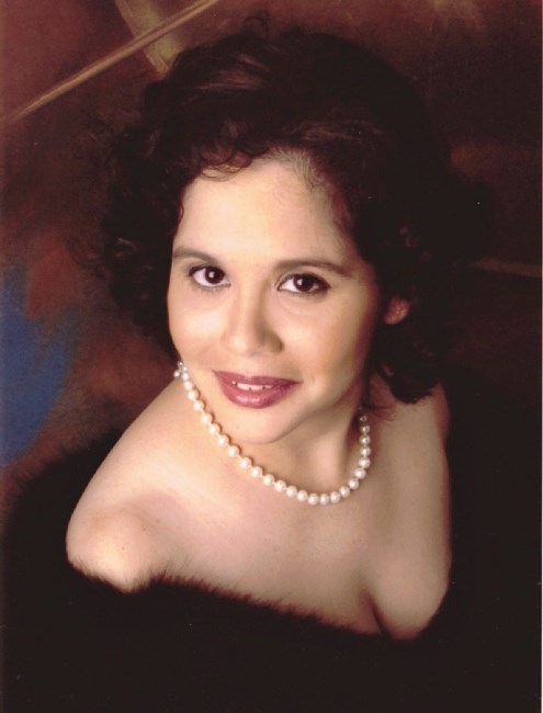 Obituary of Sandra Enid Dominguez