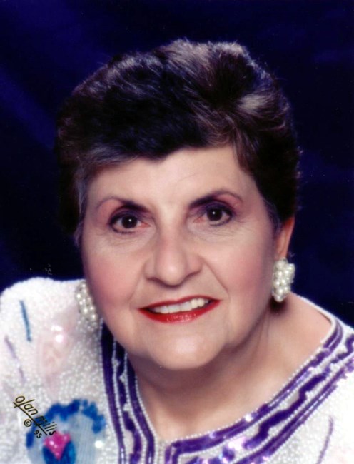 Obituary of M. Peg (Cilani) Wells