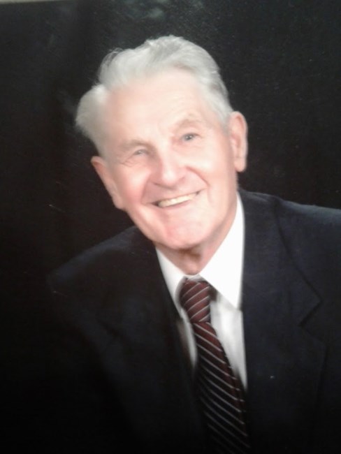 Obituary of Donald E Devine