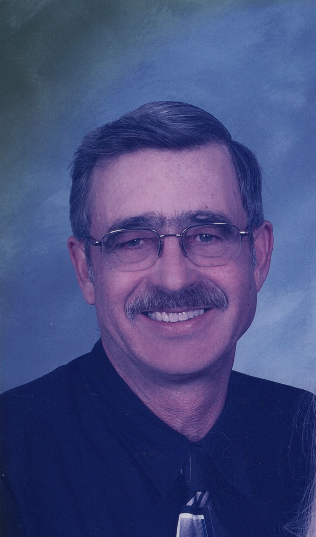 Obituary of Merlen Bruce Rollins