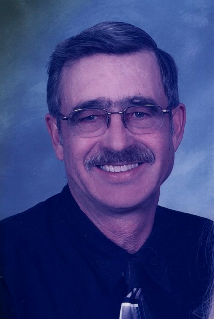 Obituary of Merlen Bruce Rollins