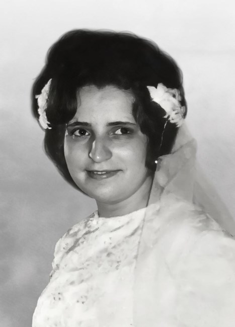 Obituary of Evelyne (De Estrela) De Melo