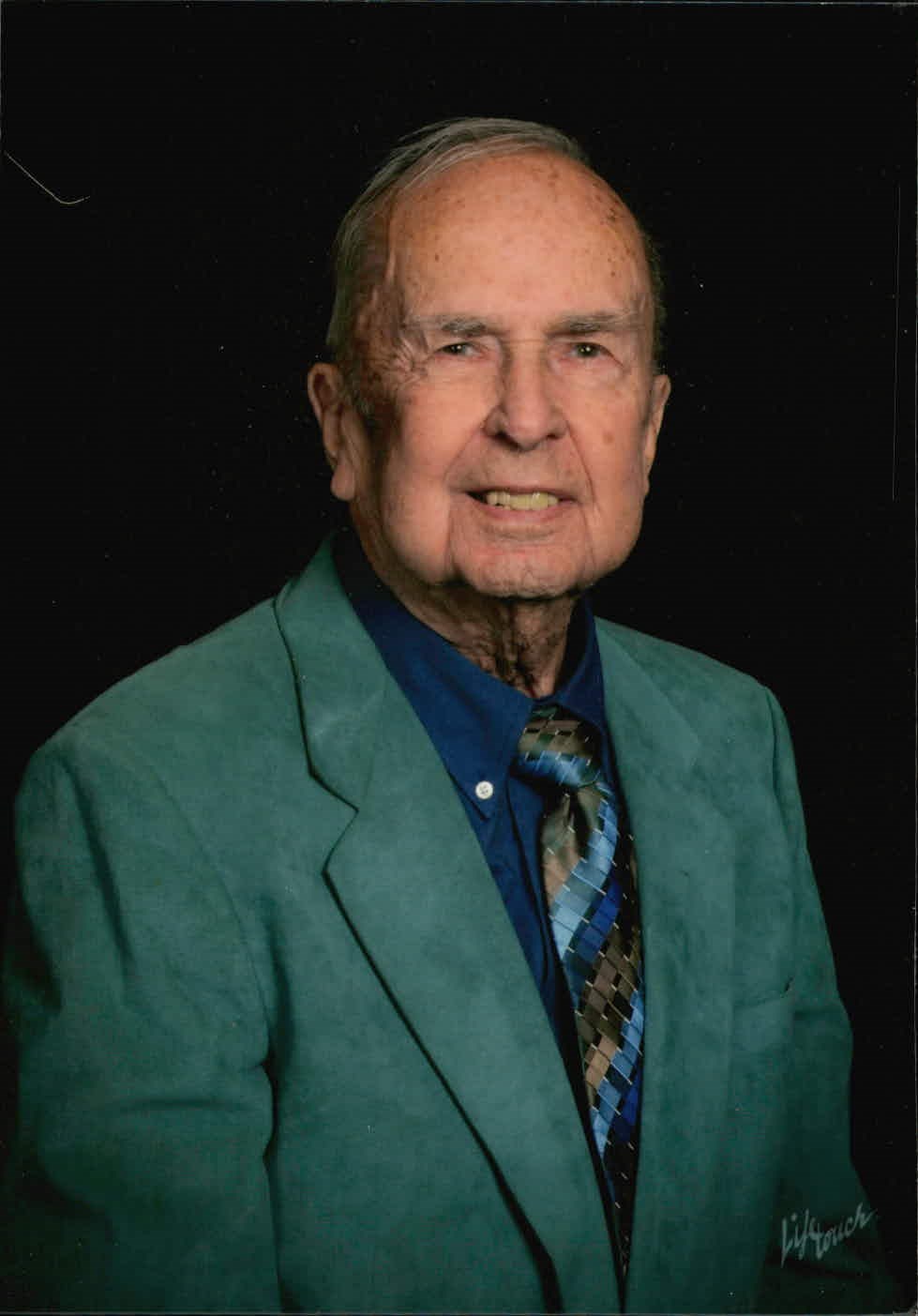 Obituario de James Alfred "Jake" Holcomb