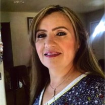 Obituary of Maria Elena Ocon