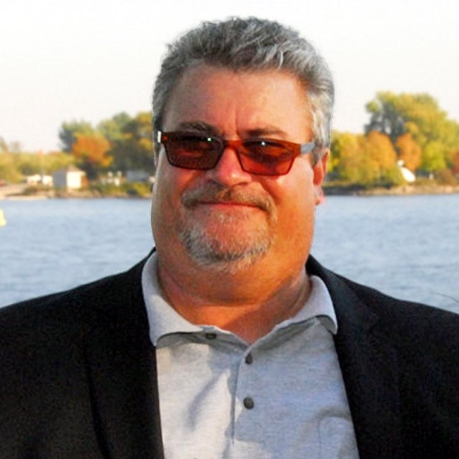 Obituary of Denis Mc Nicoll