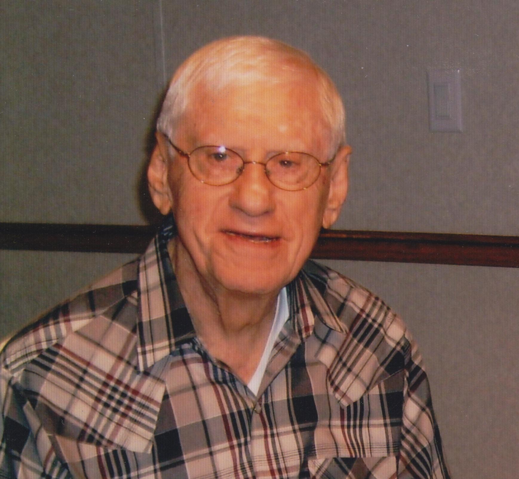 Obituary of Clarence L. Fischer