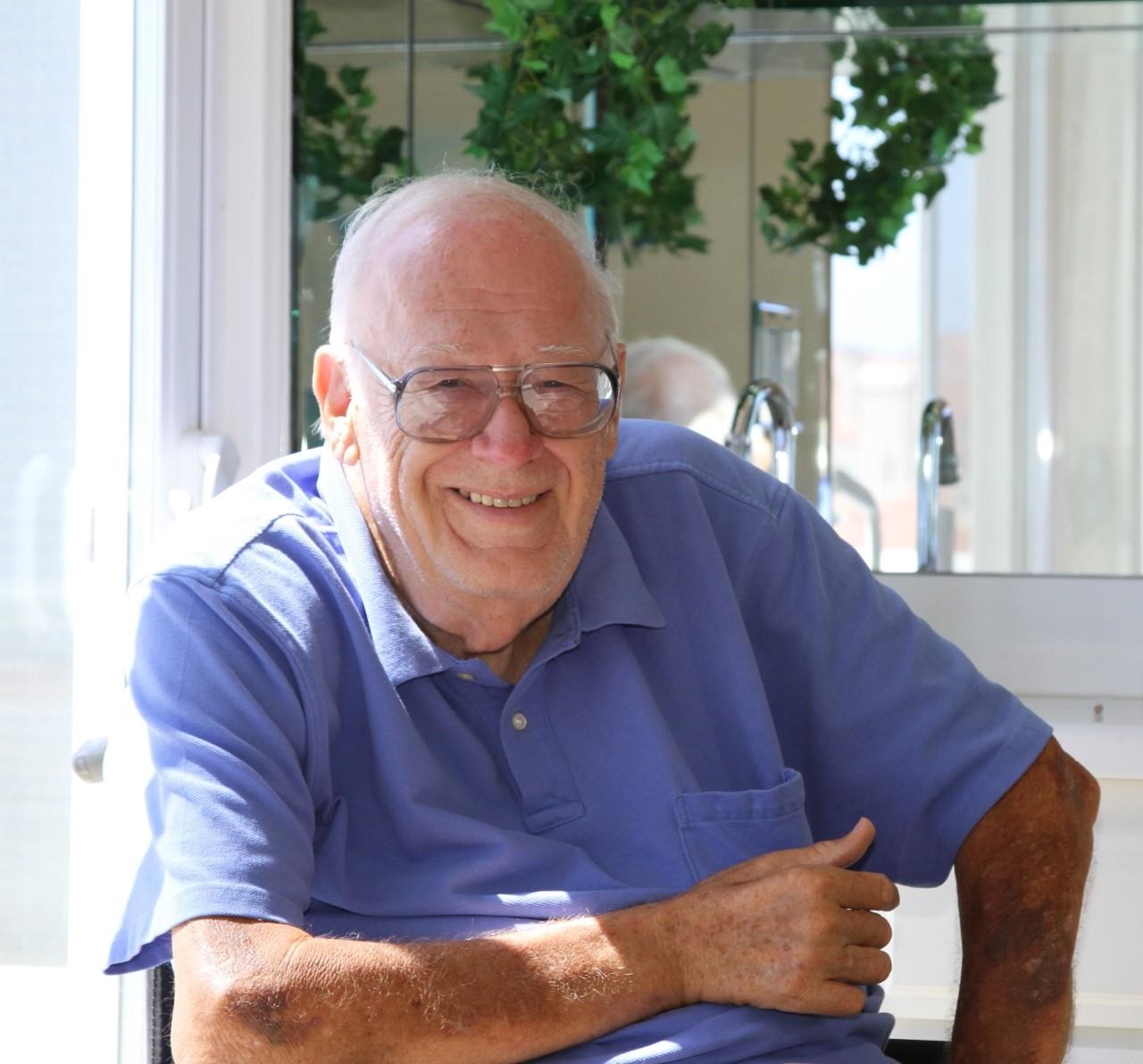 Obituary of John E Rowe