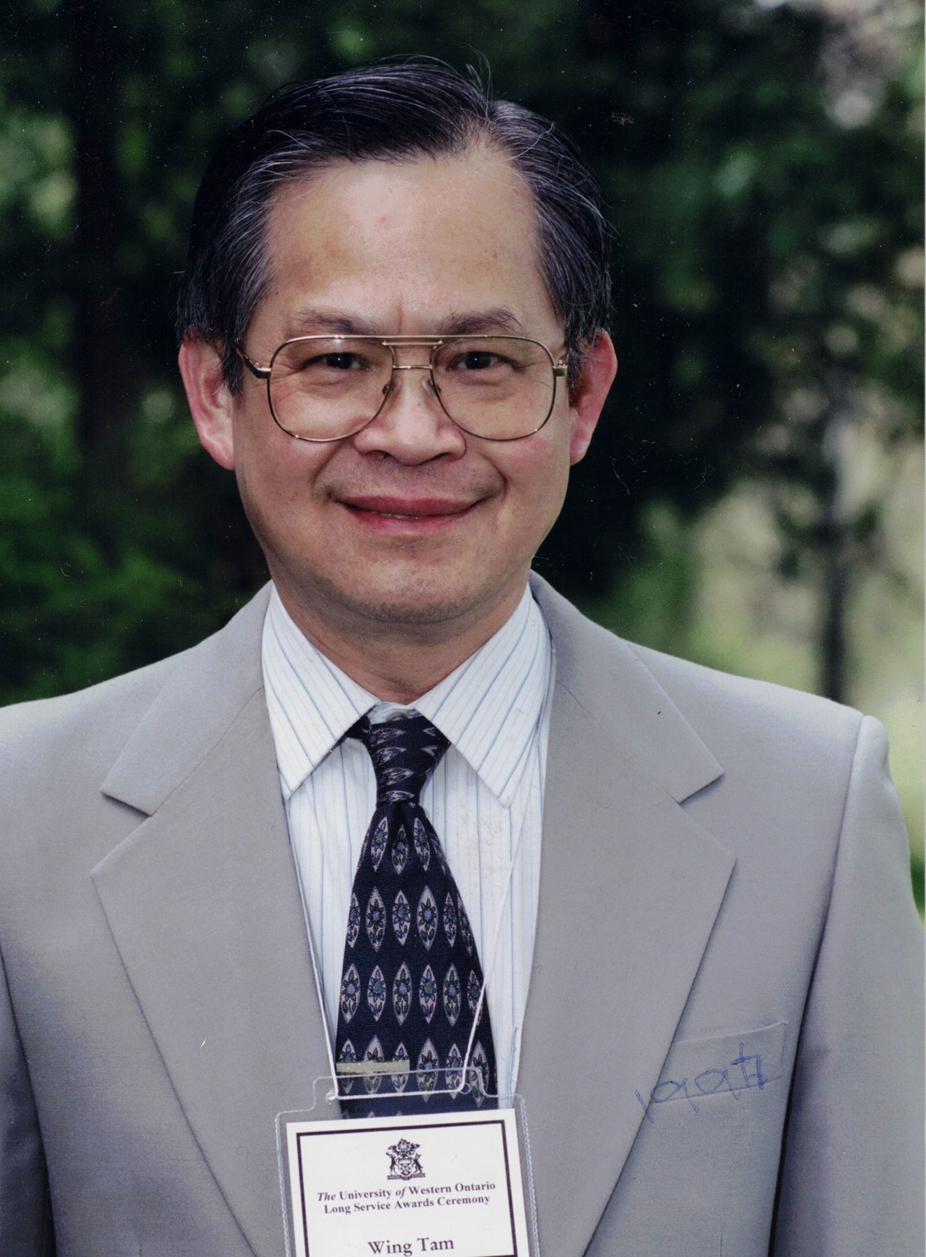 Obituary of Dr.  Wing Hong Tam
