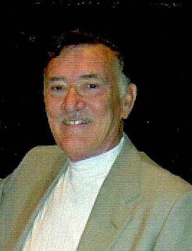 Avis de décès de E. V. "Buck" Leach