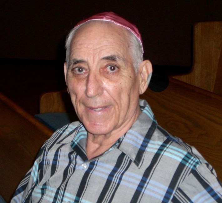 Obituary of Theodore M. Holmes