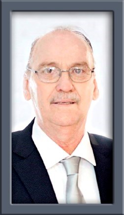 Obituary of Charles Reid