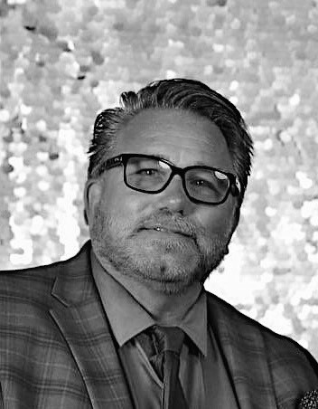 Obituary of Chris Carey