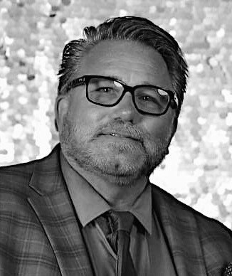 Obituary of Chris Carey