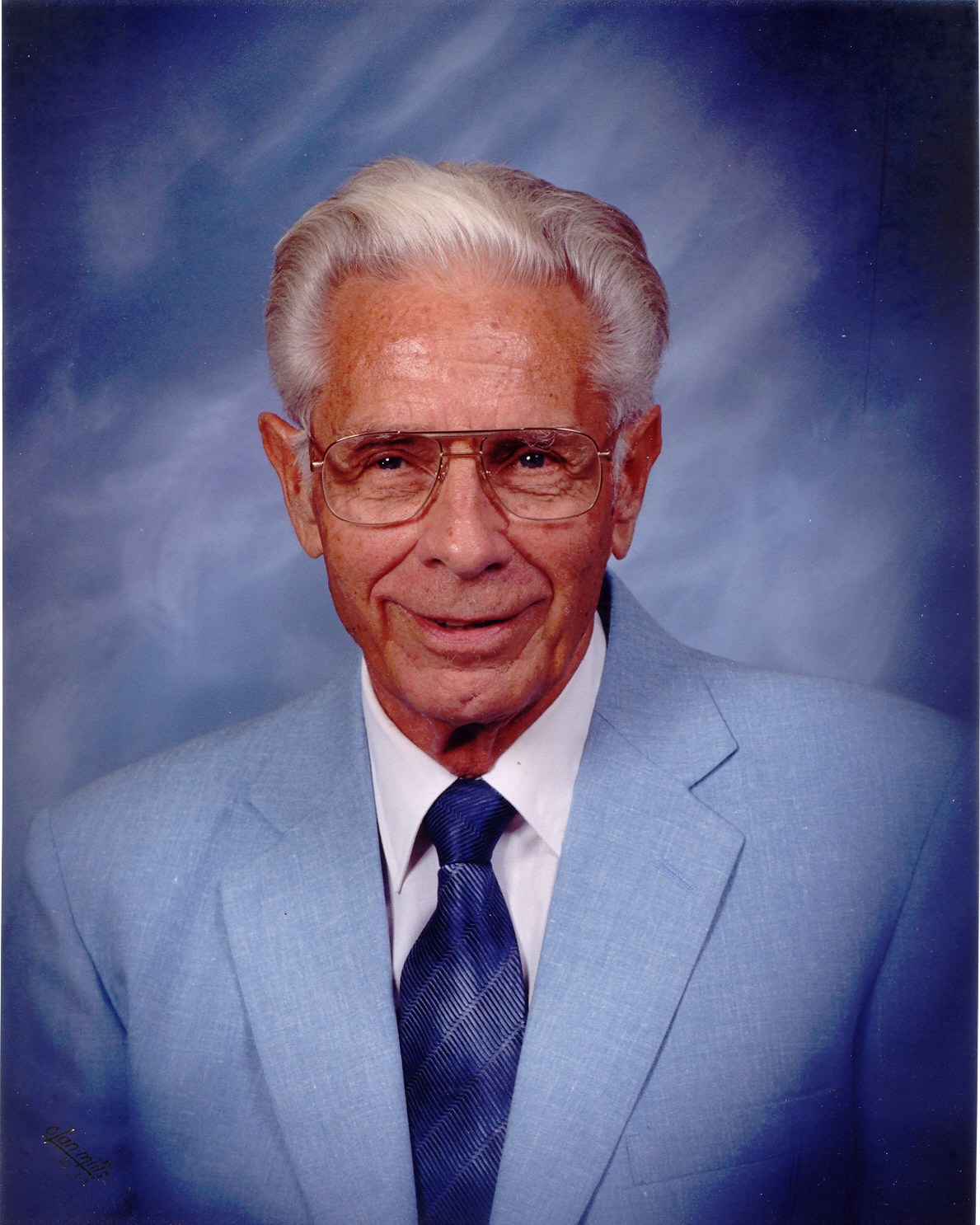 Obituary of Charles E. Harvey