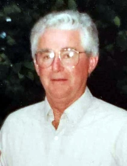 Obituary of Conrad J Dube