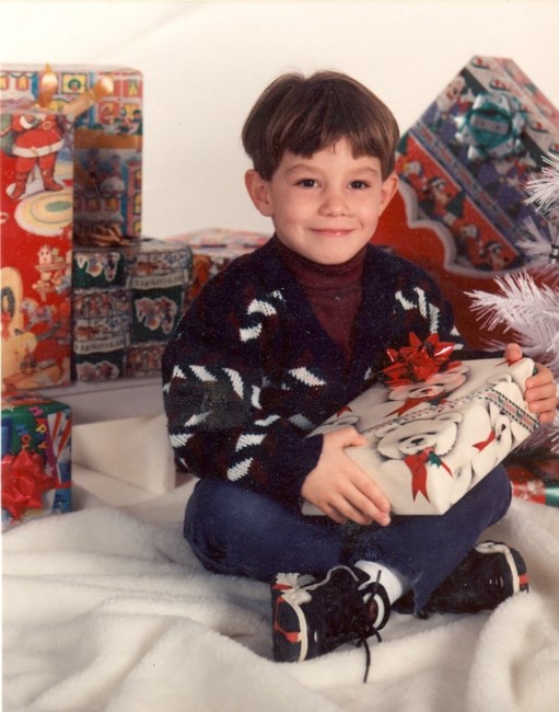 Obituary of John Paul & Alaina Renee Garnett