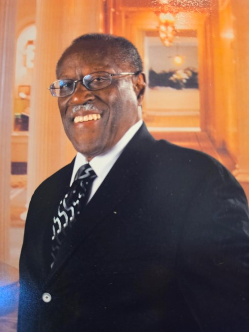Obituary of John E Houston