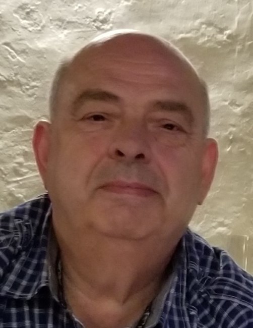 Obituary of Norman Ovile Ouimet