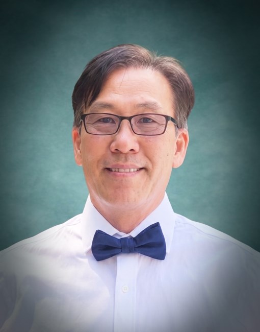 Obituary of Dr. Mike Kijin Woo