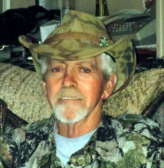 Obituary of John M. Huggins