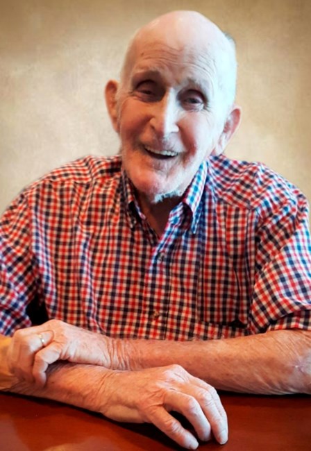 Obituary of Carl Chris "Bud" Scharfenberg Jr.
