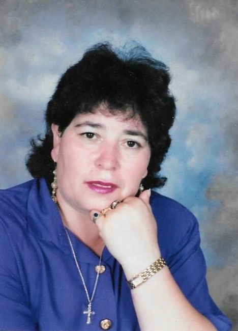 Obituario de Elvia Sandoval