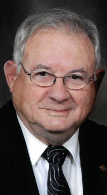 Obituary of John William Holmes