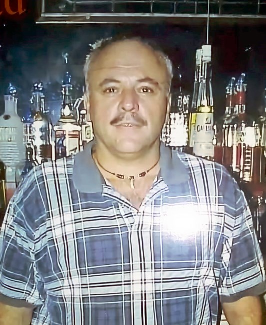 Obituario de John Wayne Champagne