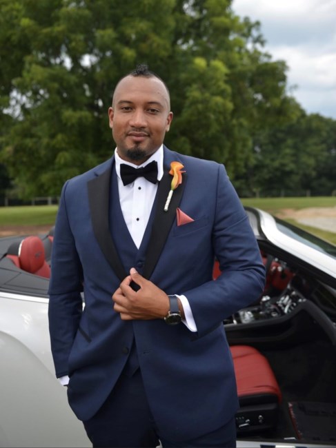 Obituary of Ainsley Clayton Bingroy Elliott