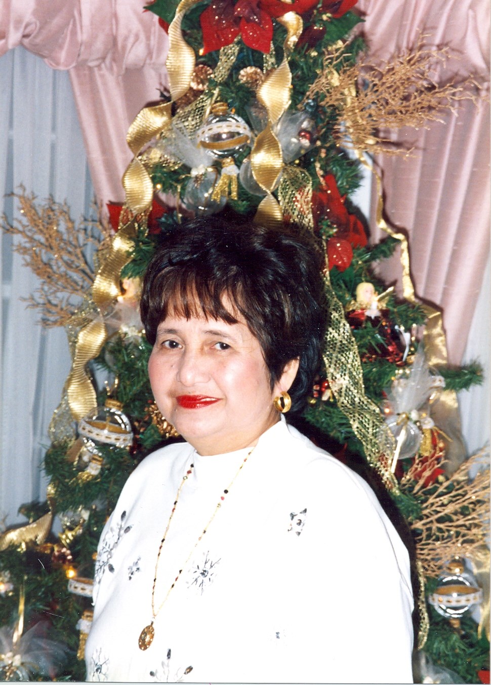 Obituary of Claudina Cruz Santos