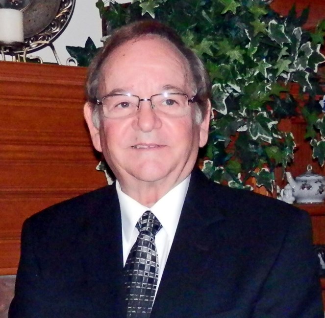 Obituary of John T. Burkholder
