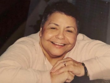 Obituary of Maria Consuelo de los Santos